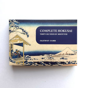 Collection of Hokusai prints with a box labeled 'Complete Hokusai Thirty-Six Views of Mount Fuji'