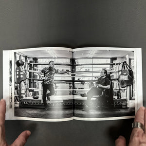 An open inside spread of the 56-page visual narrative photobook My Boxing Life Japan, showing cinematic sports photography layout.