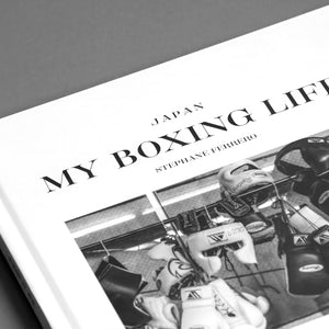 Close-up detailed view of the high-contrast black and white cover art and premium print texture of the My Boxing Life Japan photography book.
