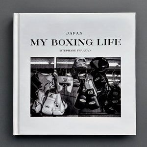 Front cover of the photobook My Boxing Life Japan, featuring a high-contrast black and white photograph of training gym equipment.